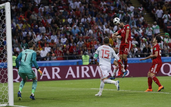 Iran&#039;s Vahid Amiri jumps for a header during the group B match between Iran and Spain at the 2018 soccer World Cup in the Kazan Arena in Kazan, Russia, Wednesday, June 20, 2018. (AP Photo/Manu Fe ...