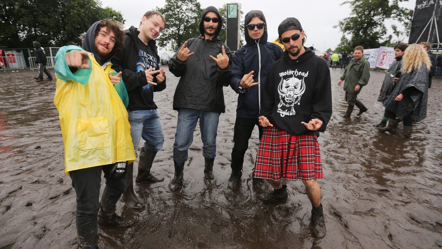 epa04866220 Italian metal fans at the Wacken Open Air festival, in Wacken, Germany, 30 July 2015. Fans from all over the globe attend the world&#039;s largest heavy metal festival from 30 July until 0 ...