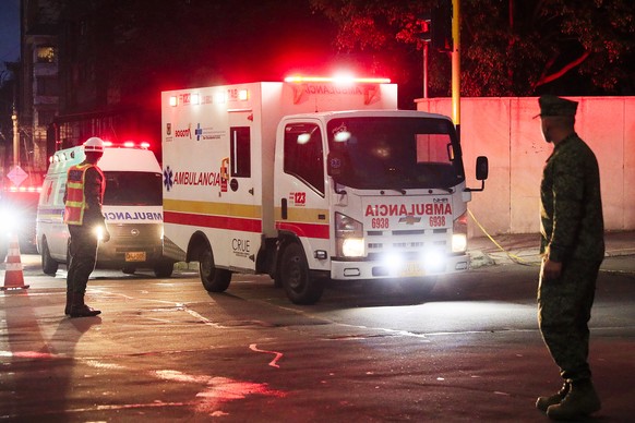 epa12845045 Ambulances transport victims of a plane crash to the Central Military Hospital in Bogota, Colombia, 23 March 2026. A Colombian Air Force (FAC) Hercules C-130 aircraft carrying 125 people c ...