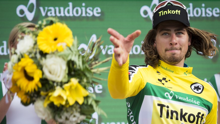 Peter Sagan from Slovakia of team Tinkoff reacts in the yellow jersey, during the 4th stage, a 193 km race from Rheinfelden to Champagne, Switzerland, at the 80th Tour de Suisse UCI ProTour cycling ra ...