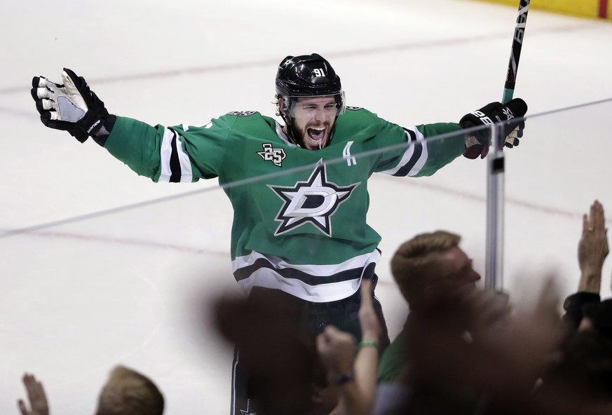 FILE - In this March 3, 2018, file photo, Dallas Stars&#039; Tyler Seguin (91) celebrates their 3-2 overtime win in an NHL hockey game against the St. Louis Blues in Dallas. Seguin has signed a $78.8  ...