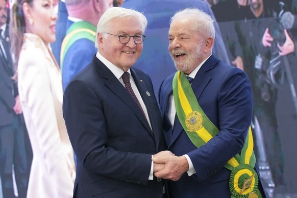 President Luiz Inacio Lula da Silva, right, poses for a picture with Germany&#039;s President Frank-Walter Steinmeier after he was sworn in as new president at the Planalto Palace in Brasilia, Brazil, ...