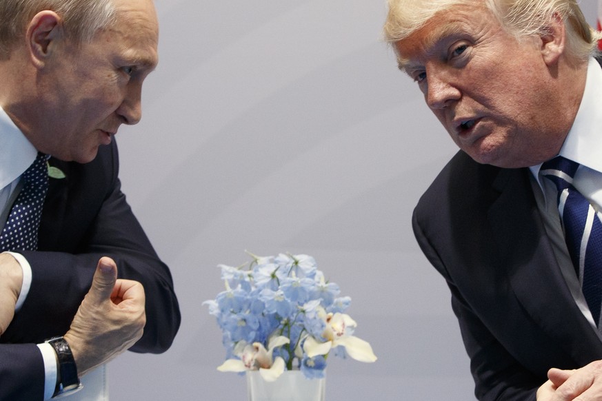 President Donald Trump meets with Russian President Vladimir Putin at the G20 Summit, Friday, July 7, 2017, in Hamburg. (AP Photo/Evan Vucci)