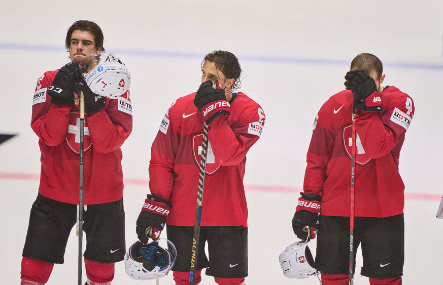 Nico Hischier Nr. 13 of Switzerland Denis Malgin, SUI 62 Andrea GLAUSER, SUI 43 sad after the match SWITZERLAND - UNITED STATES IIHF Ice hockey, Eishockey World Championship, WM, Weltmeisterschaft Qua ...