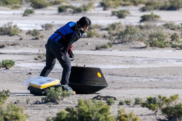 epa10881218 A handout picture made available by the National Aeronautics and Space Administration (NASA) shows Lockheed Martin System Safety Engineer Victoria Thiem performing preliminary checks on th ...