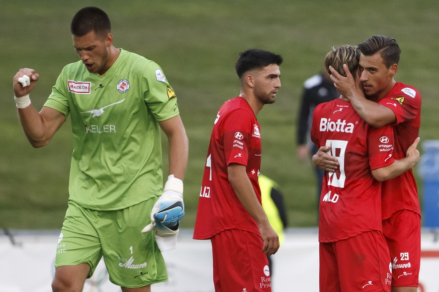 Winterthur&#039;s players goalkeeper Raphael Spiegel, left, midfielder Rijad Saliji, 2nd left, defender Enrique Wild, 2nd right, and defender Nils von Niederhaeusern, right, celebrate after beating St ...