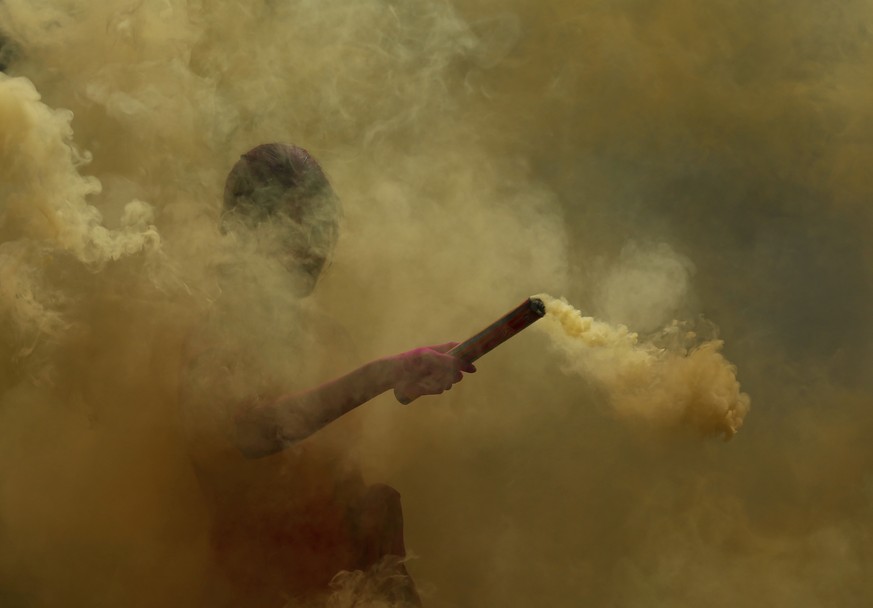 A girl celebrates Holi, the Hindu festival of colors, in Hyderabad, India, Friday, March 18, 2022. Holi also heralds the arrival of spring. (AP Photo/Mahesh Kumar A.)