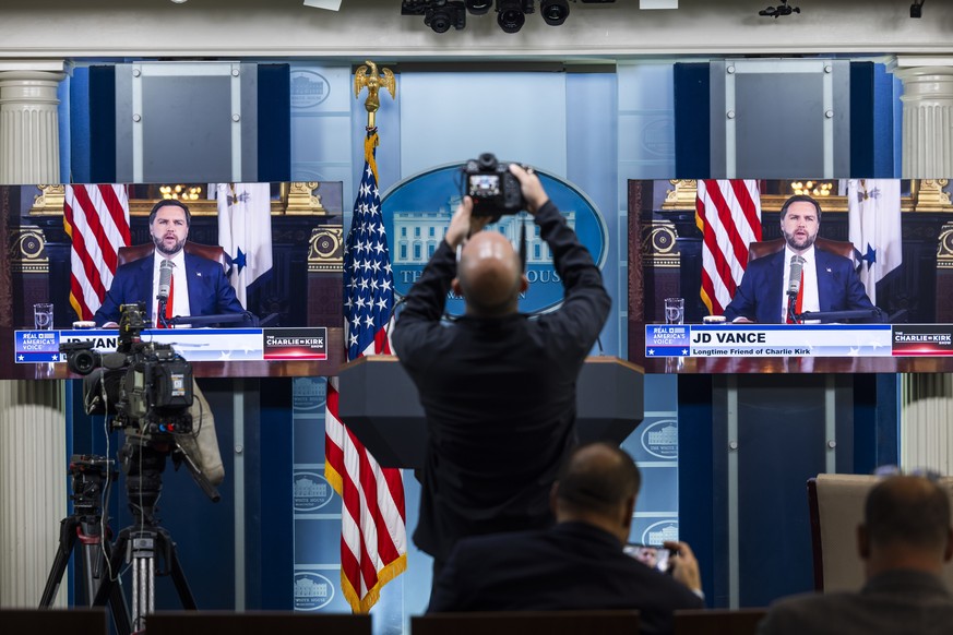 KEYPIX - epa12380810 US Vice President JD Vance is seen on TV monitors in the White House Press Briefing Room as he hosts &amp;#x2018;The Charlie Kirk Show&#039; for slain conservative activist Charli ...