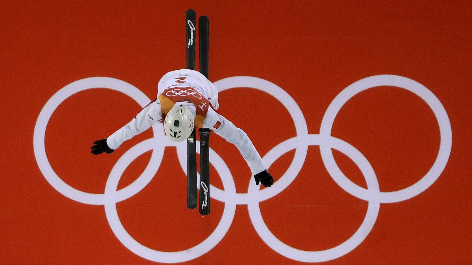 Jia Zongyang, of China, jumps during the men&#039;s aerial final at Phoenix Snow Park at the 2018 Winter Olympics in Pyeongchang, South Korea, Sunday, Feb. 18, 2018. (AP Photo/Gregory Bull)