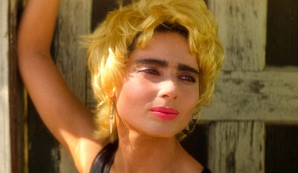 Isabella Rossellini USA. Isabella Rossellini in a scene from the CThe Samuel Goldwyn Company film: Wild at Heart 1990. Plot: Young lovers Sailor and Lula run from the variety of weirdos that Lula s mo ...