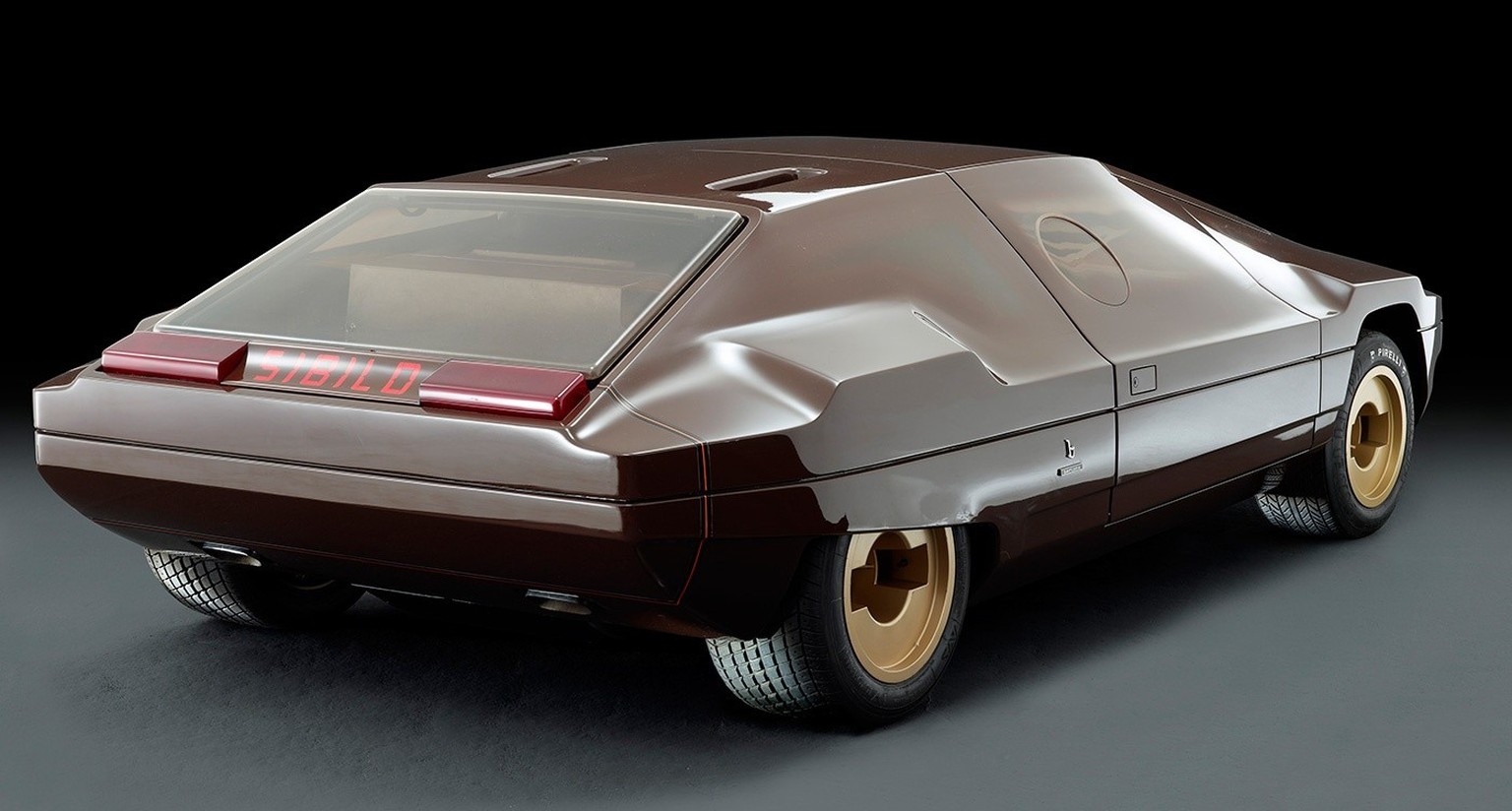 Lancia Sibilo, 1978: Designed by Marcello Gandini for Bertone. Built on a Stratos chassis, this car took the "seamless" concept to the extreme by painting the glass the same color as the bod ...