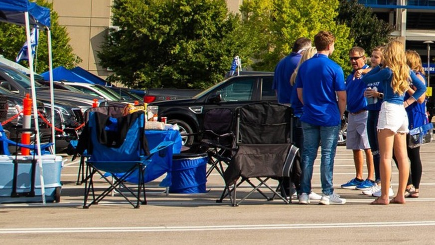 NCAA, College League, USA Football: Florida at Kentucky, Oct 2, 2021 Lexington, Kentucky, USA Fans tailgate and pass footballs before the game against the Florida Gators at Kroger Field. Mandatory Cre ...