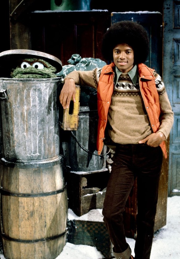LOS ANGELES - DECEMBER 8: A Special Sesame Street Christmas. A CBS television special. December 8, 1978. Pictured is Michael Jackson with Oscar the Grouch. (Photo by CBS via Getty Images)