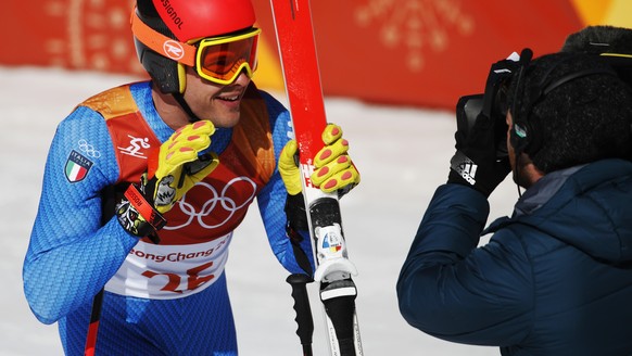 Italy&#039;s Christof Innerhofer waves to the camera after completing the downhill portion of the men&#039;s combined at the 2018 Winter Olympics in Jeongseon, South Korea, Tuesday, Feb. 13, 2018. (AP ...