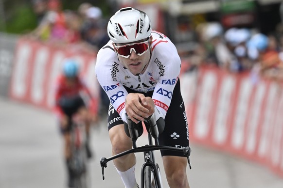 epa11415221 Marc Hirschi from Switzerland of UAE Team Emirates in action during the 8th and final stage, a 15.7 km time trial from Aigle to Villars-sur-Ollon, Switzerland, at the 87th Tour de Suisse U ...