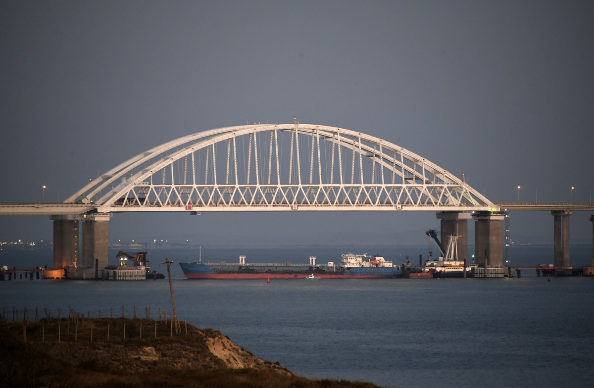 The Kerch bridge is seen blocked for ships entrance, near Kerch, Crimea, Sunday, Nov. 25, 2018. A Russian coast guard vessel rammed a Ukrainian navy tugboat near Crimea, damaging the ship's engin ...