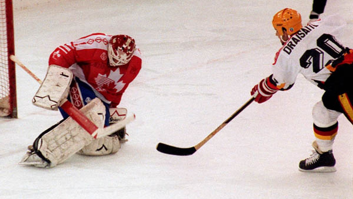 Canada's Sean Burke (goalie) competing in the hockey event against Germany at the 1992 Albertville Olympic winter Games. (CP PHOTO/COA/Scott Grant)Sean Burke (gardien) du Canada affronte l' ...