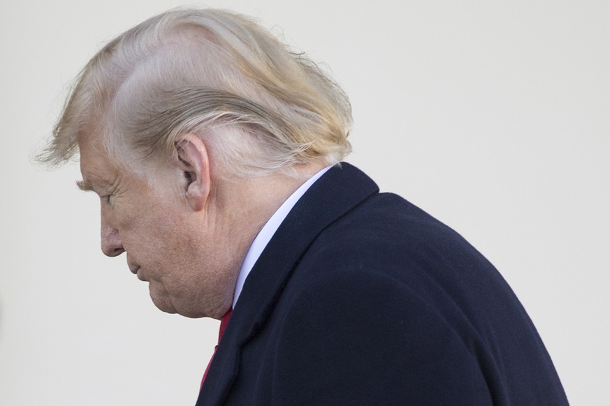 epa07319615 US President Donald J. Trump leaves after delivering remarks on ending the partial shutdown of the federal government, in the Rose Garden of the White House in Washington, DC, USA, 25 Janu ...