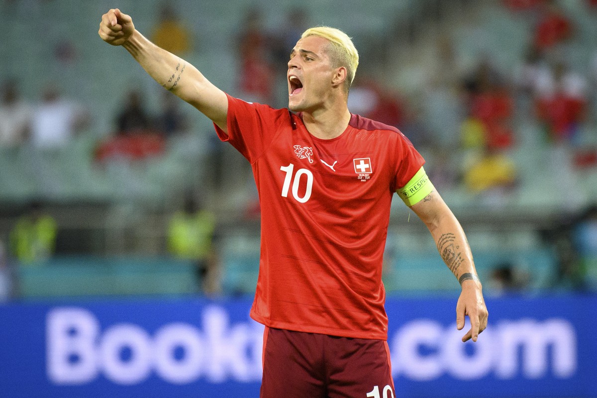 Switzerland's midfielder Granit Xhaka gestures during the Euro 2020 soccer tournament group A match between Switzerland and Turkey at the Olympic stadium, in Baku, Azerbaijan, Sunday, June 20, 20 ...