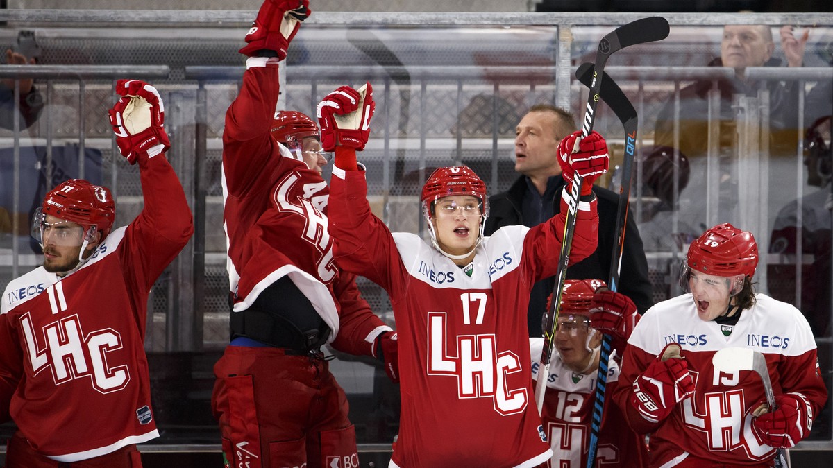 Lausanne's players forward Yannick Herren, left, forward Nicklas Danielsson, of Sweden, 2nd left, center Loic In-Albion, 3rd left, center Johnny Kneubuehler, 2nd right, and forward Axel Simic, ri ...