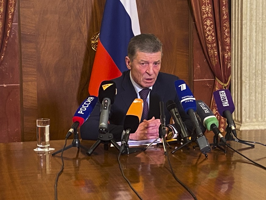 Deputy Chief of Staff of the Presidential Executive Office Dmitry Kozak addresses the media during a news conference at the Russian embassy in Berlin, Germany, early Friday, Feb. 11, 2022. Foreign pol ...