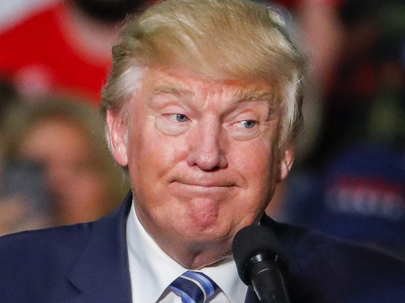 epa05585871 US Republican presidential nominee Donald Trump speaks during a campaign rally in Charlotte, North Carolina, USA, 14 October 2016. The US presidential election is scheduled for 08 November ...