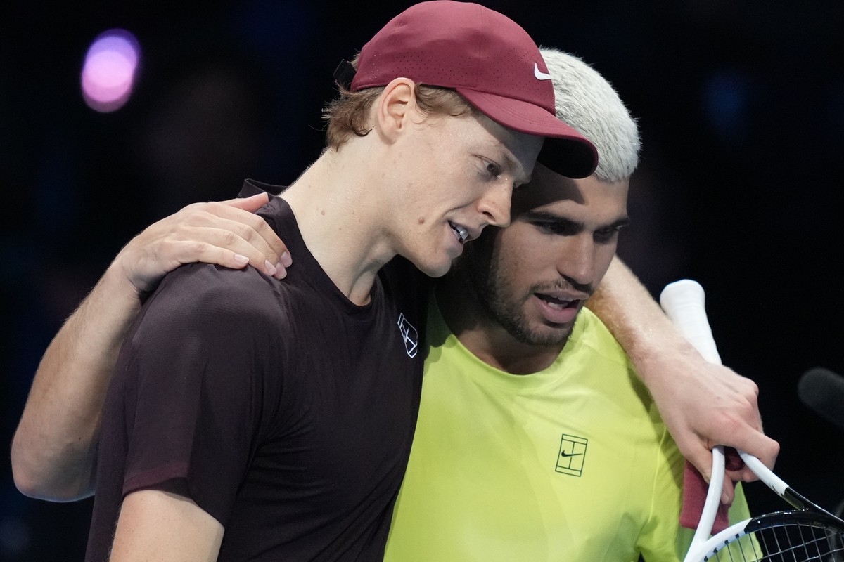 Italy's Jannik Sinner, left, and Spain's Carlos Alcaraz hug after the final tennis match of the ATP World Tour Finals, in Turin, Italy, Sunday, Nov. 16, 2025. (AP Photo/Antonio Calanni)
Ital ...