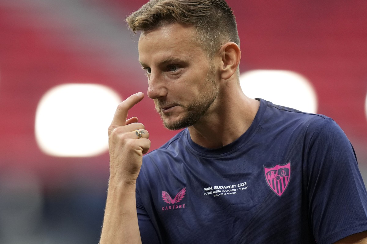 Sevilla's Ivan Rakitic gestures during a training session at the Puskas Arena in Budapest, Hungary, Tuesday, May 30, 2023. The Europa League final match between Sevilla FC and AS Roma is held in  ...
