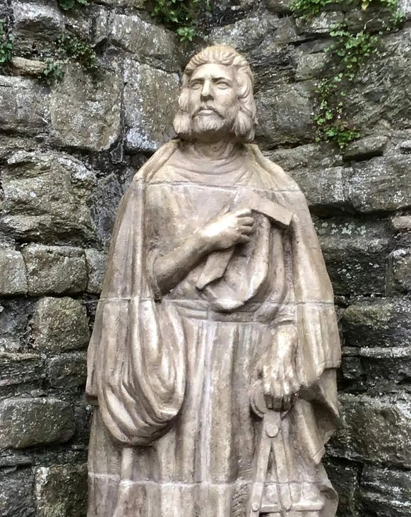 Statue von Baumeister James of St. George in der Burg Beaumaris.
https://commons.wikimedia.org/wiki/File:Master_James_statue_at_Beaumaris_Castle.jpg?uselang=de
