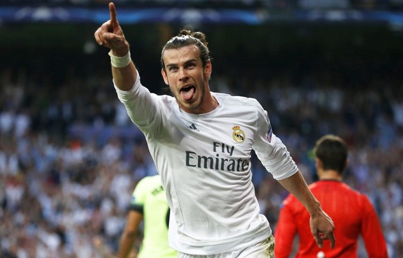 epa05289898 Real Madrid&#039;s Welsh winger Gareth Bale celebrates after scoring the 1-0 lead during the UEFA Champions League semi final, second leg soccer match between Real Madrid and Manchester Ci ...