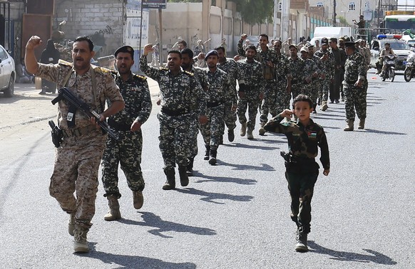 epaselect epa13229108 Houthi fighters march during a campaign to mobilize more fighters amid an offensive against Saudi-backed government troops, in Sana'a, Yemen, 10 September 2026. Yemen's ...