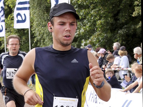 In this Sunday, Sept. 13, 2009 photo Andreas Lubitz competes at the Airportrun in Hamburg, northern Germany. Germanwings co-pilot Andreas Lubitz appears to have hidden evidence of an illness from his  ...