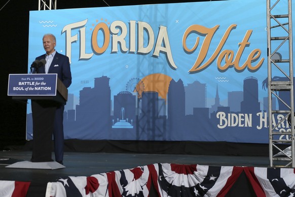 Democratic presidential candidate and former Vice President Joe Biden speaks to a crowd of supporters during a drive-in rally at the Florida State Fairgrounds, Thursday, Oct. 29, 2020 in Tampa, Fla. ( ...