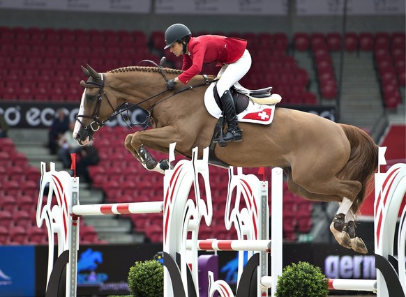 epa03832375 Janika Sprunger, SUI, on the horse Palloubet D&#039;Halong during the ECCO FEI European Championships 2013, in Herning, Denmark, 21 August 2013. EPA/Henning Bagger Nf Alle