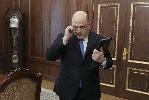 Russian Federal Tax Service chief Mikhail Mishustin arrives for his meeting with Russian President Vladimir Putin in Moscow, Russia, Monday, May 6, 2019. (Mikhail Klimentyev, Sputnik, Kremlin Pool Pho ...
