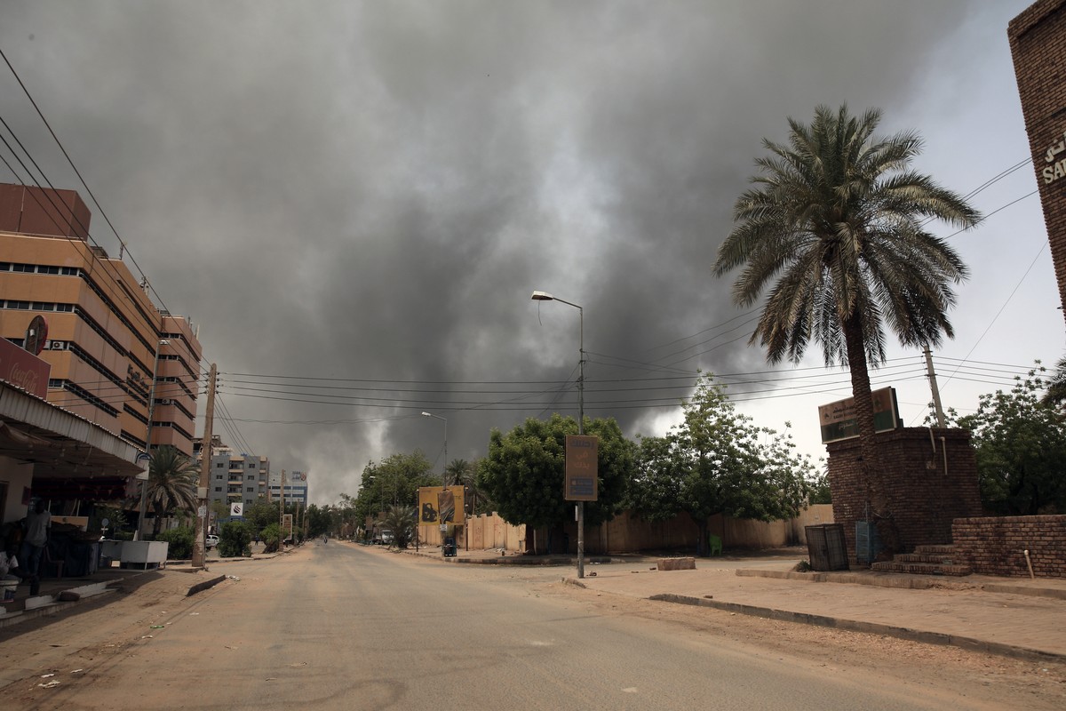 Smoke is seen rising from a neighborhood in Khartoum, Sudan, Saturday, April 15, 2023. Fierce clashes between Sudan's military and the country's powerful paramilitary erupted in the capital  ...