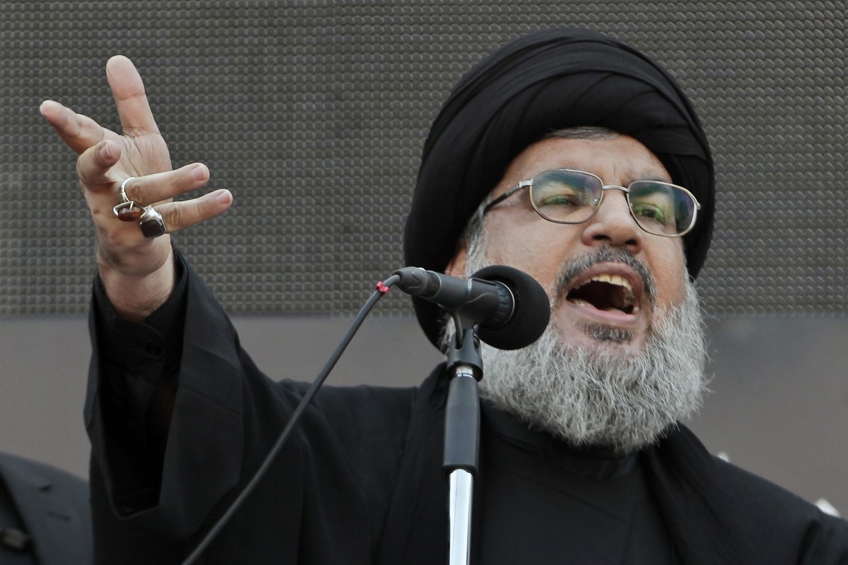 FILE - Hezbollah leader Sheik Hassan Nasrallah, speaks to the crowd in a rare public appearance during Ashura, that marks the death of Shiite Islam's Imam Hussein, in the suburbs of Beirut, Thurs ...