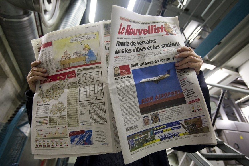 La nouvelle formule du journal Le Nouvelliste est photographiee dans le centre d&#039;impression ce lundi 4 avril 2011 a Sion. Cinq journaux regionaux romands font peau neuve ce mardi. &quot;L&#039;Ex ...