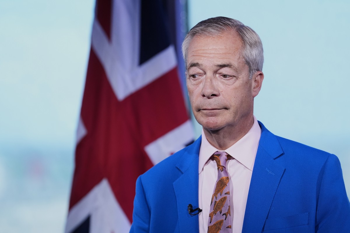 Reform UK leader Nigel Farage looks on as he makes a statement to the media at the party headquarters in Millbank, central London, Tuesday July 7, 2026. (Gareth Fuller/PA via AP)
Britain Politics