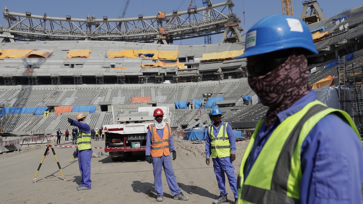 Workers work at Lusail Stadium, one of the 2022 World Cup stadiums, in Lusail, Qatar, Friday, Dec. 20, 2019. Construction is underway to complete Lusail's 80,000-seat venue for the opening game a ...