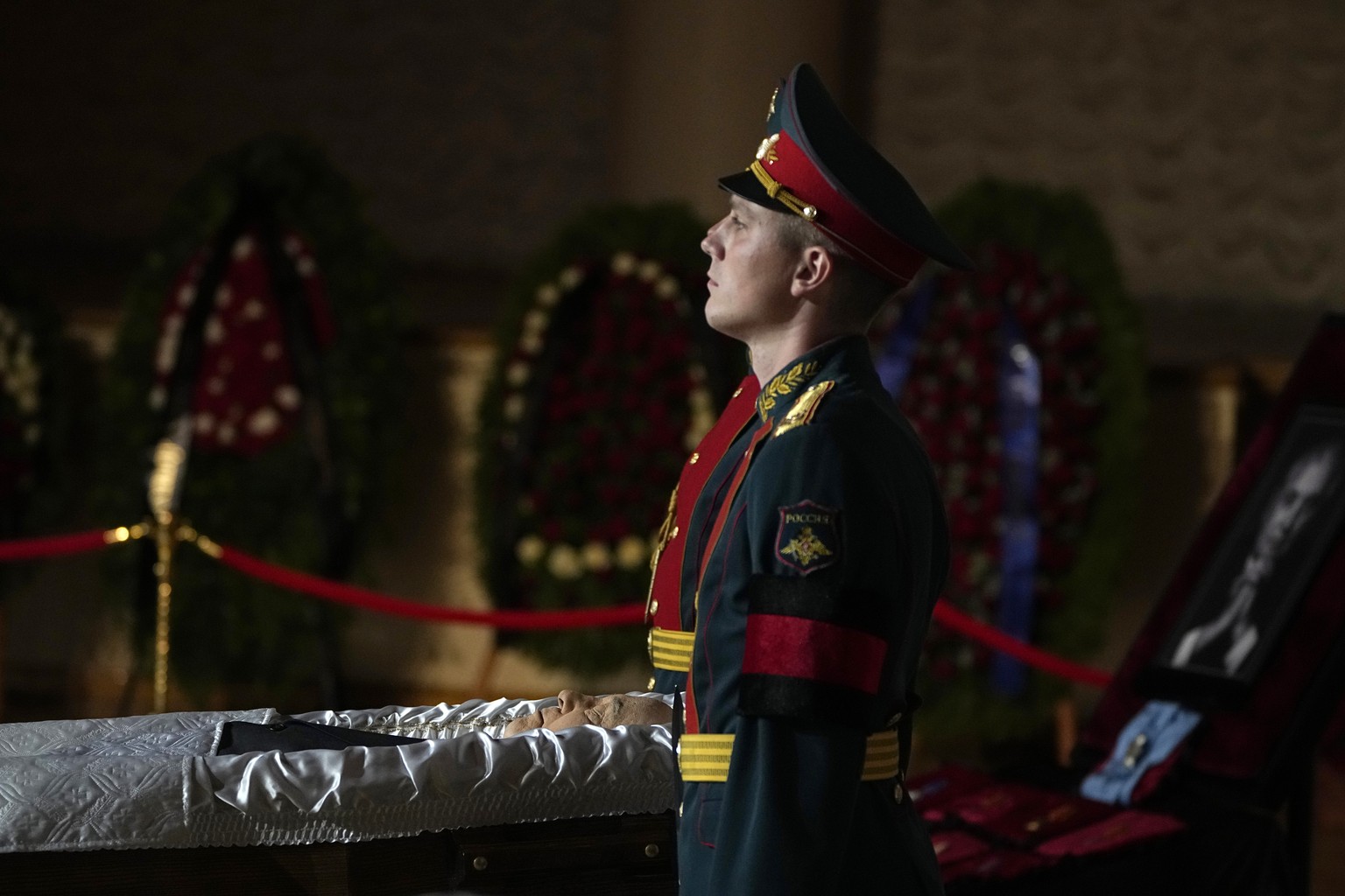 Honour guards stand by the coffin of former Soviet President Mikhail Gorbachev inside the Pillar Hall of the House of the Unions during a farewell ceremony in Moscow, Russia, Saturday, Sept. 3, 2022.  ...