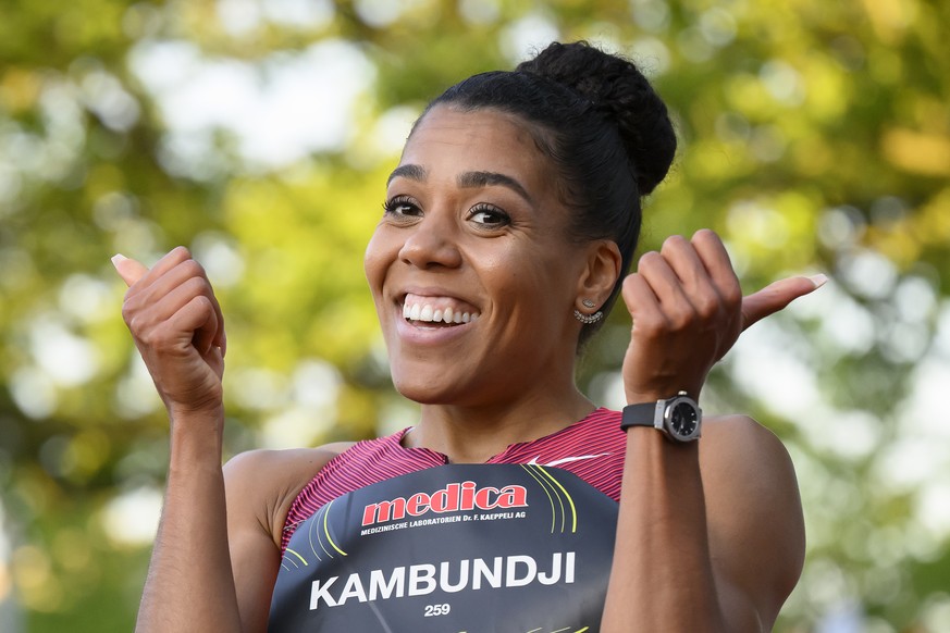 Mujinga Kambundji, reacts after crosses the finish line during the Women's 200 Metres, at the Citius Meeting in the Athletics stadium Wankdorf in Bern, Switzerland, Tuesday, June 14, 2022. (KEYSTONE/A ...