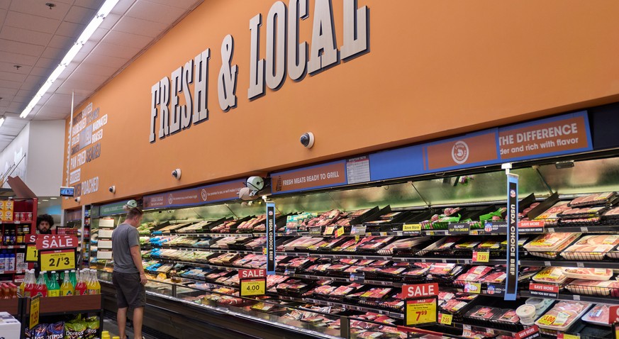 epa12372161 A person shops for meat at a grocery store in Los Angeles, California, 12 September 2025. Meat prices, especially beef, remains elevated, ground beef is 12.8 percent higher than in August  ...