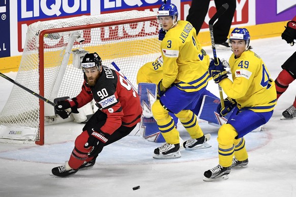 epa05980061 Canada&#039;s forward Ryan O&#039;Reilly (L) in action against Sweden&#039;s John Klingberg (C) and Victor Rask (R) during the 2017 IIHF Ice Hockey World Championship final between Canada  ...