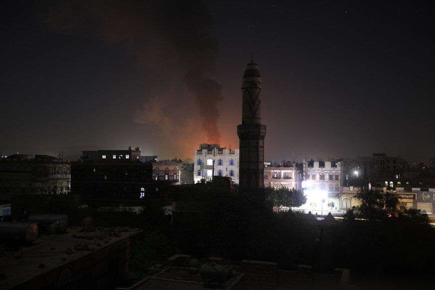 epa11179309 Smokes rise from a Houthi position following US and UK strikes in Sana&#039;a, Yemen, 24 February 2024. The US and Britain conducted new strikes against Yemen&#039;s Houthi positions in th ...