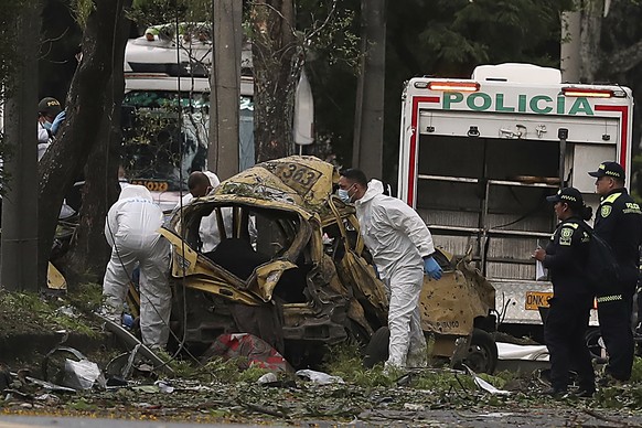 Forensics inspect the site of a bomb explosion outside an Air Force base in Cali, Colombia, Thursday, Aug. 21, 2025. (AP Photo/Santiago Saldarriaga)
Pictures of the Week Latin America and Caribbean Ph ...