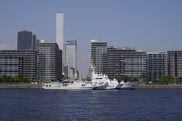 Japanese Coast Guard boats dock in Tokyo Bay outside of the Olympic athletes&#039; village ahead of the 2020 Summer Olympics, Monday, July 19, 2021, in Tokyo. (AP Photo/Charlie Riedel)