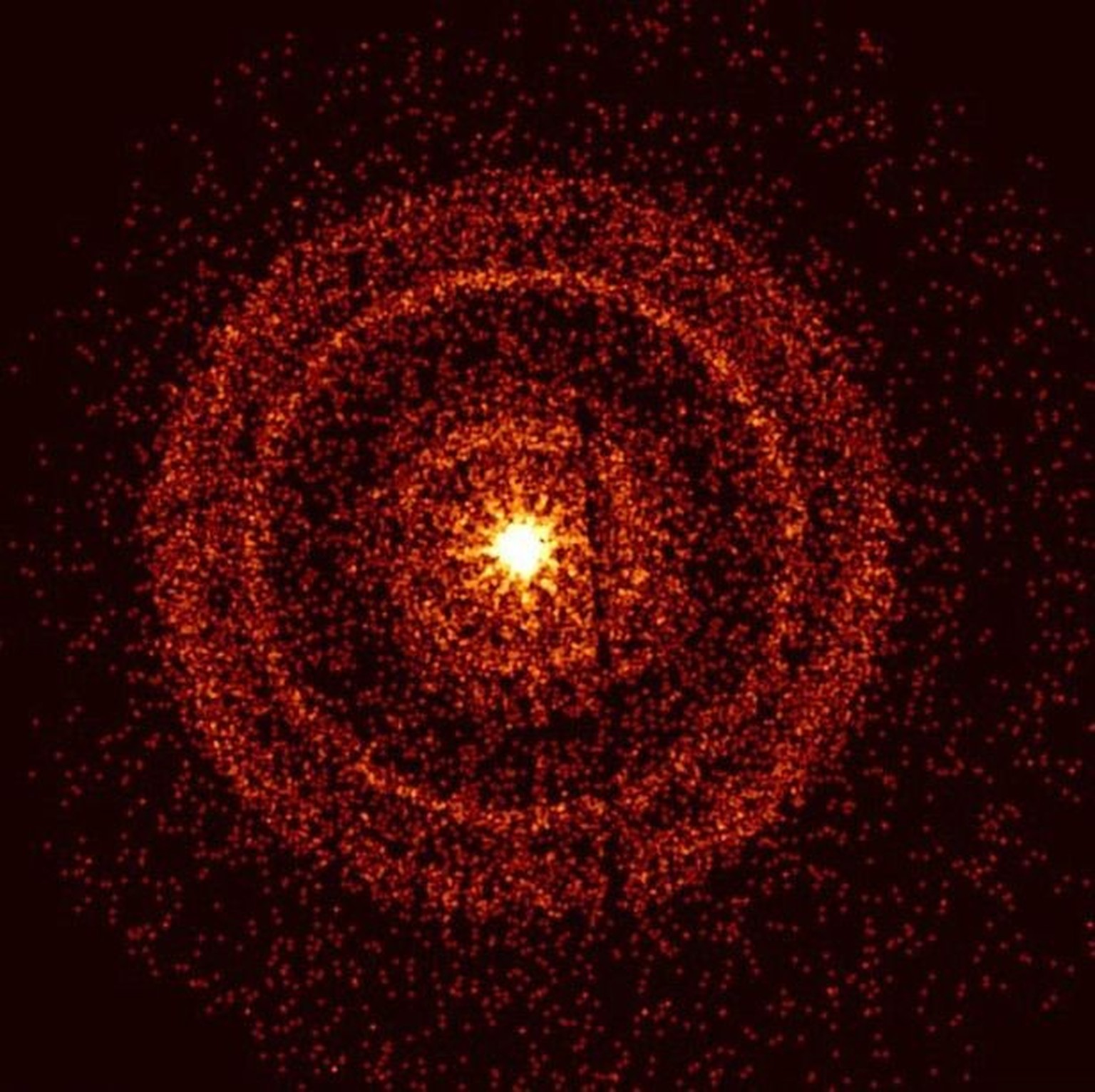 Gammablitz: Das Nachleuchten von GRB 221009A etwa eine Stunde nach seiner Entdeckung. Die hellen Ringe entstehen durch Röntgenstrahlen, die von sonst nicht beobachtbaren Staubschichten in unserer Gala ...
