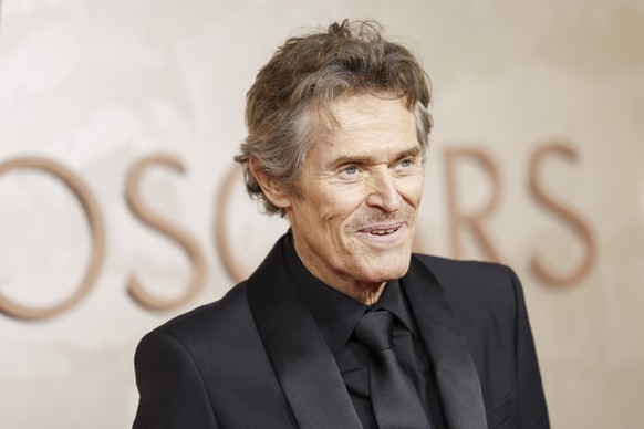 epa11936022 American actor Willem Dafoe arrives on the red carpet during the 97th annual Academy Awards ceremony at the Dolby Theatre in the Hollywood neighborhood of Los Angeles, California, USA, 02  ...