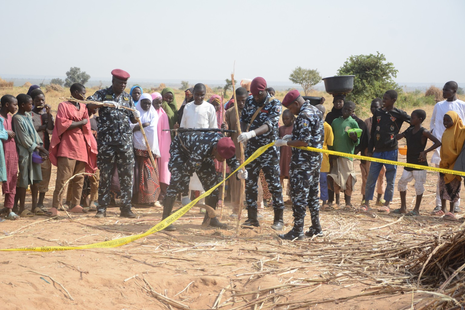 Nigeria police, Anti-Bomb squad, secure the scene of a U.S. airstrike in Northwest, Jabo, Nigeria, Friday, Dec. 26, 2025. (AP Photo/ Tunde Omolehin)
US-Trump-Nigeria-Millitary-Strikes